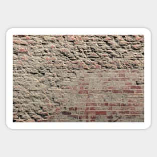 A bricked out wall with soft light creating hard shadows Sticker